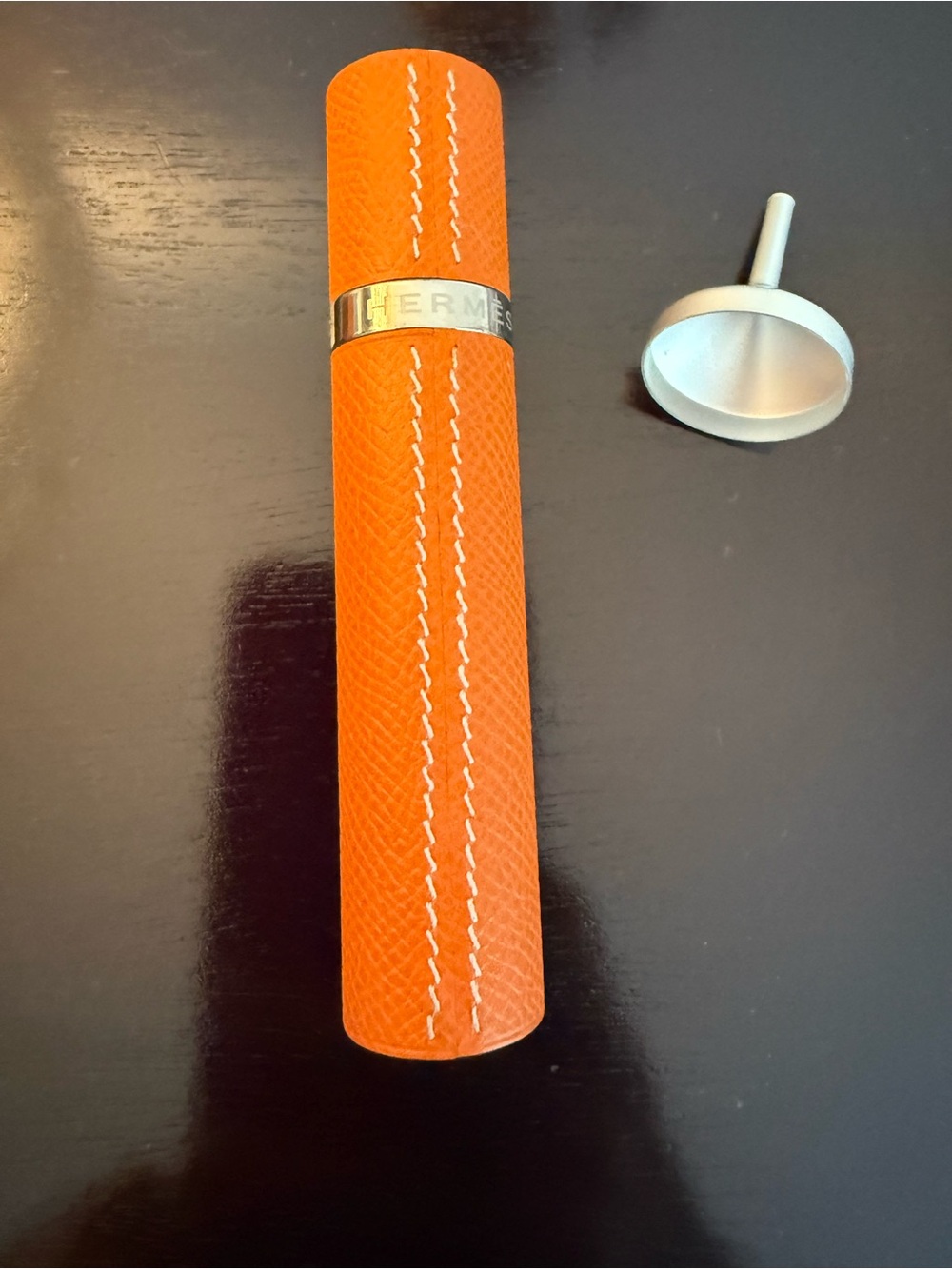 Hermes Orange Leather Atomizer with Silver Band
